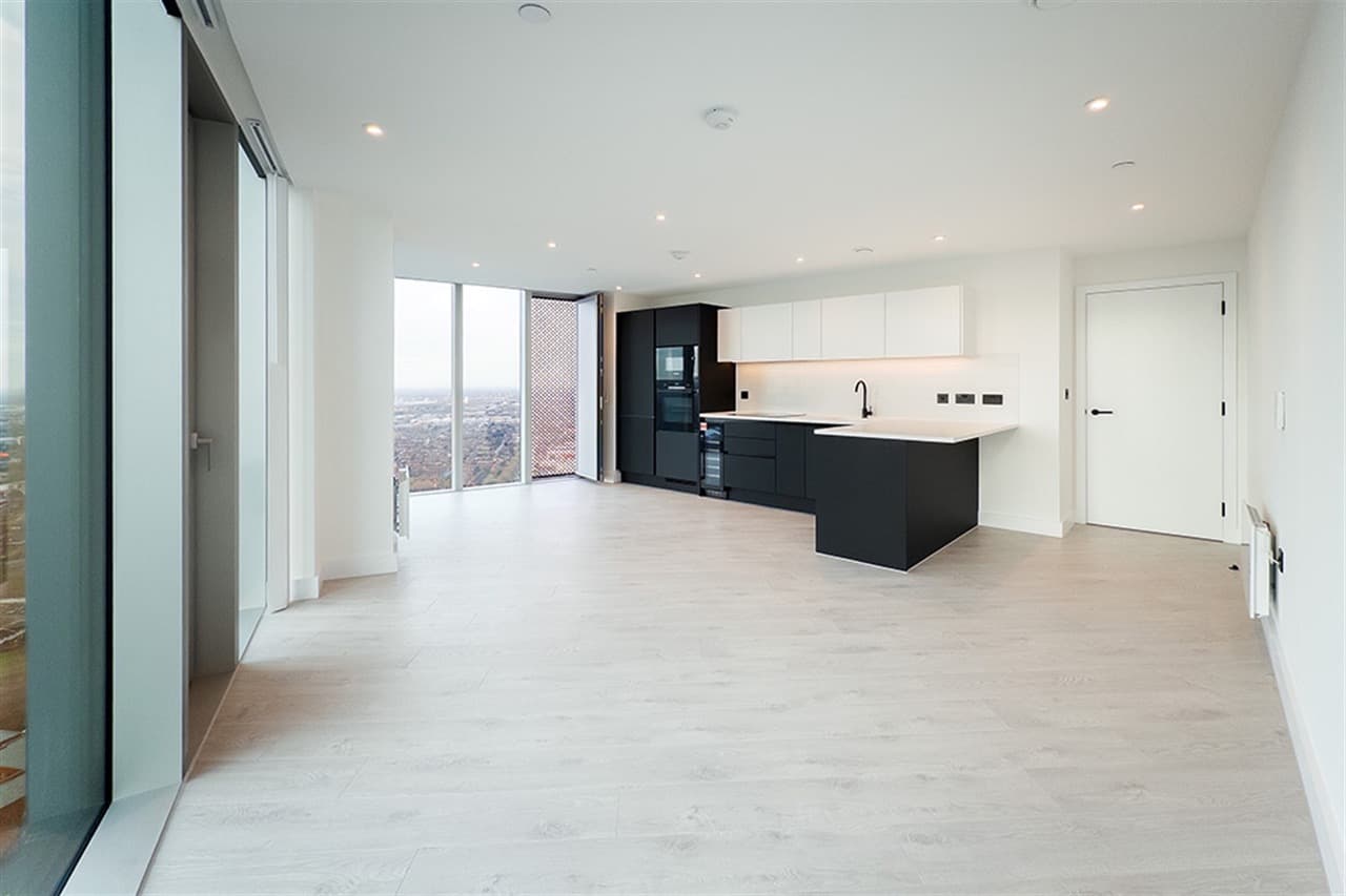Freshly cleaned apartment living space and kitchen at Vista River Gardens, Manchester, ready for a new tenancy